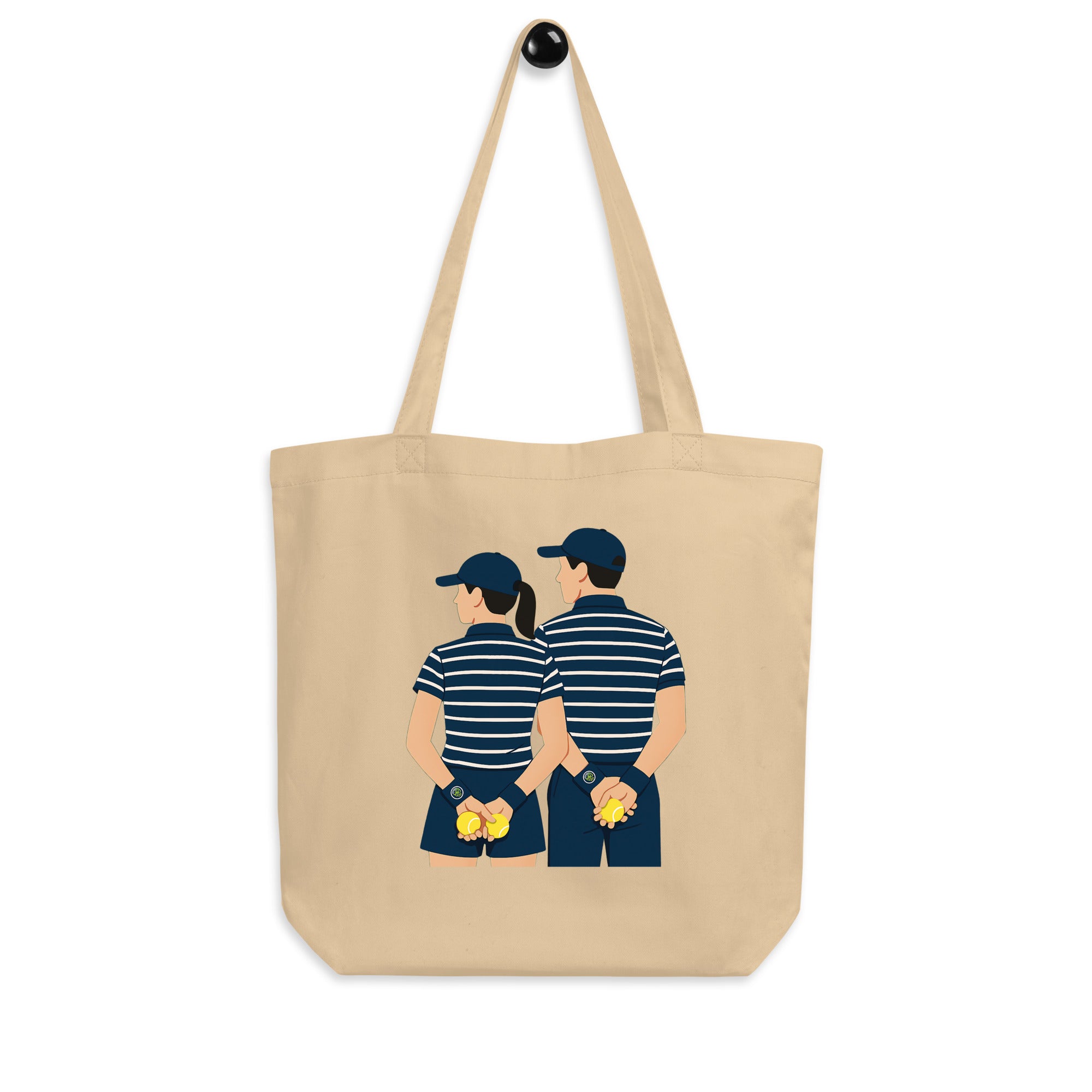 Natural (beige) organic cotton tote bag featuring “Ball kids” graphic – front hanging display view