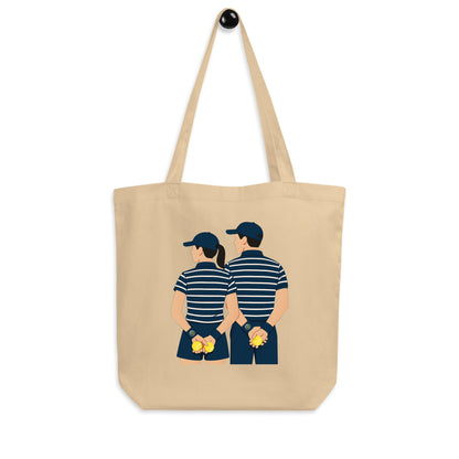Natural (beige) organic cotton tote bag featuring “Ball kids” graphic – front hanging display view