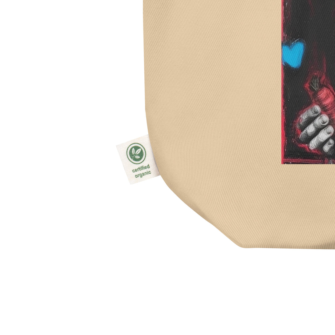 Angled close-up of Certified organic cotton tote bag seams and “Powered by Carrot” Jannik Sinner graphic