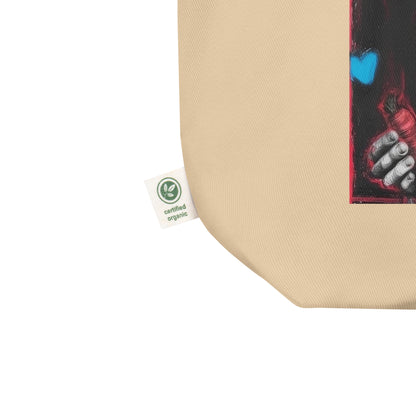 Angled close-up of Certified organic cotton tote bag seams and “Powered by Carrot” Jannik Sinner graphic