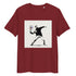 Burgundy organic cotton tee with Banksy-style tennis player graphic – front view